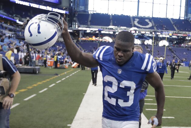 Indianapolis Colts' Frank Gore runs off the field following an NFL football game against the Houston Texans, Sunday, Dec. 31, 2017, in Indianapolis. Indianapolis won 22-13. (AP Photo/Michael Conroy)