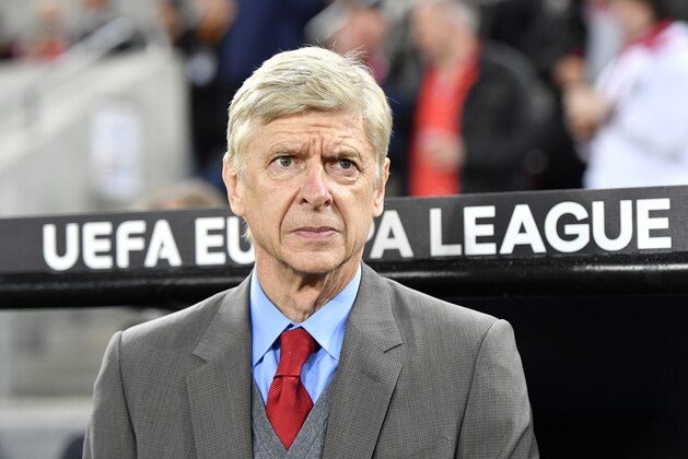 Arsenal manager Arsene Wenger waits for the beginning of the soccer Europa League group H match between FC Cologne and Arsenal in Cologne, Germany, Thursday, Nov. 23, 2017. (AP Photo/Martin Meissner)