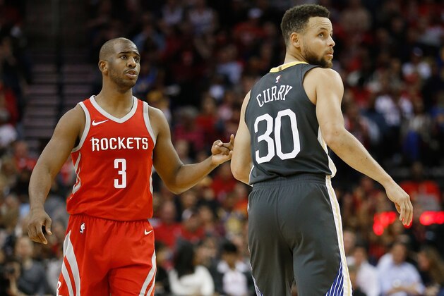 HOUSTON, TX - JANUARY 20:   Chris Paul #3 of the Houston Rockets and Stephen Curry #30 of the Golden State Warriors at Toyota Center on January 20, 2018 in Houston, Texas. NOTE TO USER: User expressly acknowledges and agrees that, by downloading and or using this photograph, User is consenting to the terms and conditions of the Getty Images License Agreement.  (Photo by Bob Levey/Getty Images)