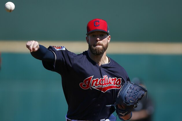 Cleveland Indians starting pitcher Corey Kluber warms up prior to a spring training baseball game against the Oakland Athletics Tuesday, Feb. 27, 2018, in Goodyear, Ariz. The Indians defeated the Athletics 16-8. (AP Photo/Ross D. Franklin)