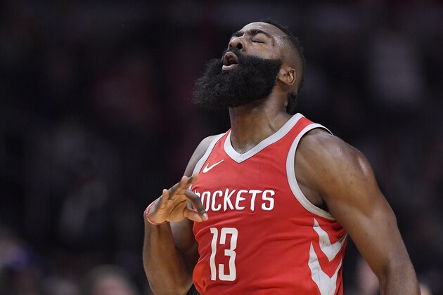 Houston Rockets guard James Harden celebrates after hitting a 3-point shot during the first half of the team's NBA basketball game against the Los Angeles Clippers, Wednesday, Feb. 28, 2018, in Los Angeles. (AP Photo/Mark J. Terrill)