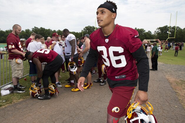 This June 15, 2016 photo shows Washington Redskins' safety Su'a Cravens walking from the field during the NFL football teams minicamp at the Redskins Park in Ashburn, Va. Cravens had to be talked out of retiring on Sunday, Sept. 3, 2017 during a meeting with team president Bruce Allen, and his future with the team is in doubt. (AP Photo/Manuel Balce Ceneta)