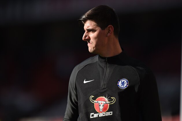 Chelsea's Belgian goalkeeper Thibaut Courtois warms up ahead of the English Premier League football match between Manchester United and Chelsea at Old Trafford in Manchester, north west England, on February 25, 2018. / AFP PHOTO / Oli SCARFF / RESTRICTED TO EDITORIAL USE. No use with unauthorized audio, video, data, fixture lists, club/league logos or 'live' services. Online in-match use limited to 75 images, no video emulation. No use in betting, games or single club/league/player publications. / (Photo credit should read OLI SCARFF/AFP/Getty Images) Chelsea's Belgian goalkeeper Thibaut Courtois warms up ahead of the English Premier League football match between Manchester United and Chelsea at Old Trafford in Manchester, north west England, on February 25, 2018. / AFP PHOTO / Oli SCARFF / RESTRICTED TO EDITORIAL USE. No use with unauthorized audio, video, data, fixture lists, club/league logos or 'live' services. Online in-match use limited to 75 images, no video emulation. No use in betting, games or single club/league/player publications. / (Photo credit should read OLI SCARFF/AFP/Getty Images)