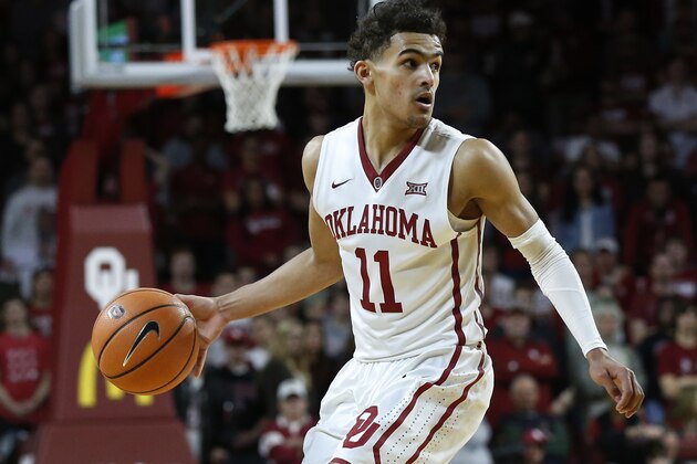Oklahoma guard Trae Young (11) in the second half of an NCAA college basketball game against Texas in Norman, Okla., Saturday, Feb. 17, 2018. (AP Photo/Sue Ogrocki)