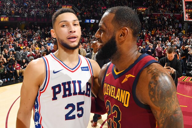 CLEVELAND, OH - DECEMBER 9:  Ben Simmons #25 of the Philadelphia 76ers and LeBron James #23 of the Cleveland Cavaliers speak on the court after the game on December 9, 2017 at Quicken Loans Arena in Cleveland, Ohio.  NOTE TO USER: User expressly acknowledges and agrees that, by downloading and or using this Photograph, user is consenting to the terms and conditions of the Getty Images License Agreement. Mandatory Copyright Notice: Copyright 2017 NBAE (Photo by Jesse D. Garrabrant/NBAE via Getty Images)
