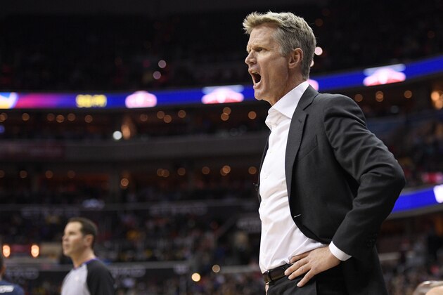 Golden State Warriors coach Steve Kerr yells during the first half of the teame's NBA basketball game against the Washington Wizards, Wednesday, Feb. 28, 2018, in Washington. (AP Photo/Nick Wass)