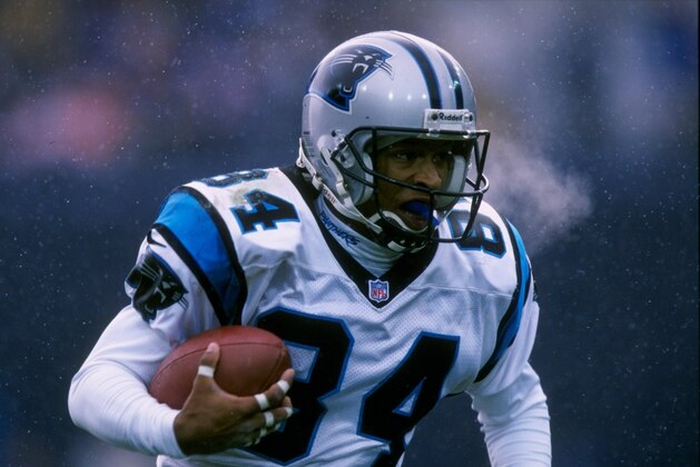 9 Nov 1997:  Wide receiver Rae Carruth of the Carolina Panthers moves the ball during a game against the Denver Broncos at Mile High Stadium in Denver, Colorado.  The Broncos won the game, 34-0. Mandatory Credit: Brian Bahr  /Allsport