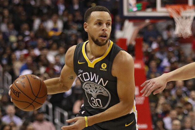 WASHINGTON, DC - FEBRUARY 28: Stephen Curry #30 of the Golden State Warriors in action against the Washington Wizards at Capital One Arena on February 28, 2018 in Washington, DC. NOTE TO USER: User expressly acknowledges and agrees that, by downloading and or using this photograph, User is consenting to the terms and conditions of the Getty Images License Agreement. (Photo by Patrick Smith/Getty Images)