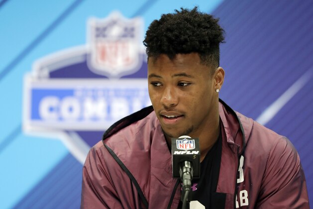 Penn State running back Saquon Barkley speaks during a press conference at the NFL football scouting combine, Thursday, March 1, 2018, in Indianapolis. (AP Photo/Darron Cummings)