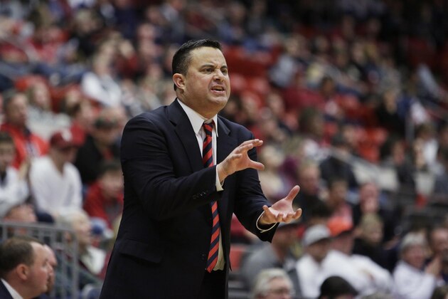 Arizona head coach Sean Miller directs his team during the second half of an NCAA college basketball game against Washington State in Pullman, Wash., Wednesday, Jan. 31, 2018. (AP Photo/Young Kwak)