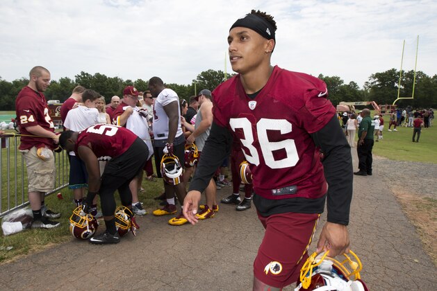 This June 15, 2016 photo shows Washington Redskins' safety Su'a Cravens walking from the field during the NFL football teams minicamp at the Redskins Park in Ashburn, Va. Cravens had to be talked out of retiring on Sunday, Sept. 3, 2017 during a meeting with team president Bruce Allen, and his future with the team is in doubt. (AP Photo/Manuel Balce Ceneta)
