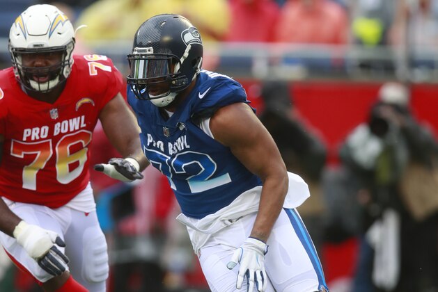 Seattle Seahawks defensive end Michael Bennett rushes in during the NFL Pro Bowl football game Sunday, Jan. 28, 2018, in Orlando, Fla. The AFC won 24-23. (Jeff Haynes/AP Images for Panini)