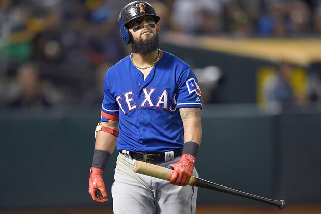 OAKLAND, CA - SEPTEMBER 22:  Rougned Odor #12 of the Texas Rangers walks back to the dugout after striking out against the Oakland Athletics in the top of the ninth inning at Oakland Alameda Coliseum on September 22, 2017 in Oakland, California.  (Photo by Thearon W. Henderson/Getty Images)