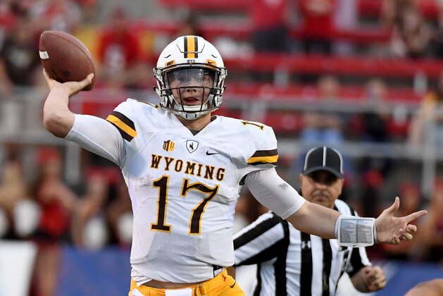 LAS VEGAS, NV - NOVEMBER 12:  Quarterback Josh Allen #17 of the Wyoming Cowboys throws against the UNLV Rebels during their game at Sam Boyd Stadium on November 12, 2016 in Las Vegas, Nevada. UNLV won 69-66 in triple overtime.  (Photo by Ethan Miller/Getty Images)