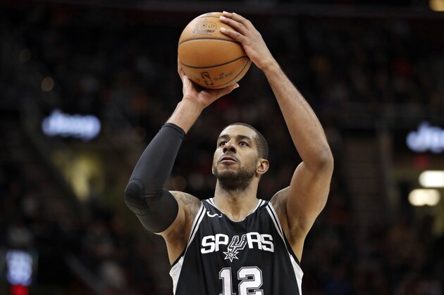 San Antonio Spurs' LaMarcus Aldridge shoots against the Cleveland Cavaliers in the first half of an NBA basketball game, Sunday, Feb. 25, 2018, in Cleveland. (AP Photo/Tony Dejak)