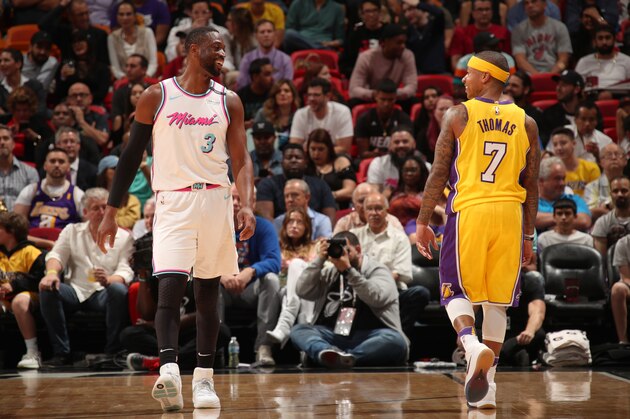 MIAMI, FL - MARCH 1: Dwyane Wade #3 of the Miami Heat and Isaiah Thomas #7 of the Los Angeles Lakers talk during the game on March 1, 2018 at American Airlines Arena in Miami, Florida. NOTE TO USER: User expressly acknowledges and agrees that, by downloading and or using this Photograph, user is consenting to the terms and conditions of the Getty Images License Agreement. Mandatory Copyright Notice: Copyright 2018 NBAE (Photo by Issac Baldizon/NBAE via Getty Images)