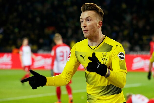 DORTMUND, GERMANY - FEBRUARY 26: Marco Reus of Borussia Dortmund celebrates 1-0  during the German Bundesliga  match between Borussia Dortmund v FC Augsburg at the Signal Iduna Park on February 26, 2018 in Dortmund Germany (Photo by Peter Lous/Soccrates/Getty Images)