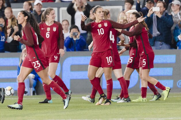 SAN JOSE, CA - NOVEMBER 12:  Carli Lloyd #10 of the USA gestures to the fans after scoring a goal during an international friendly against Canada on November 12, 2017 at Avaya Stadium in San Jose, California.  Other visible players include Christen Press #23, Andi Sullivan #6, Megan Rapinoe #15, and Kelley O'Hara #5, all of the USA.   (Photo by David Madison/Getty Images)