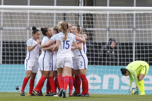 England players celebrate a goal against France during the first half of a SheBelieves Cup women's soccer match Thursday, March 1, 2018, in Columbus, Ohio. (AP Photo/Jay LaPrete)