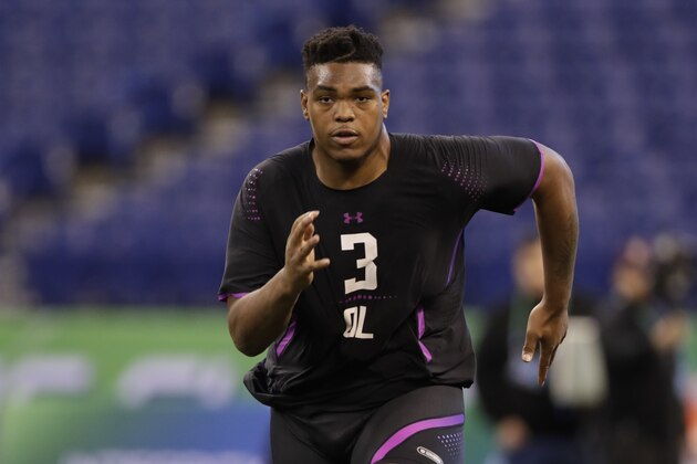 Oklahoma offensive lineman Orlando Brown runs a drill at the NFL football scouting combine in Indianapolis, Friday, March 2, 2018. (AP Photo/Michael Conroy)