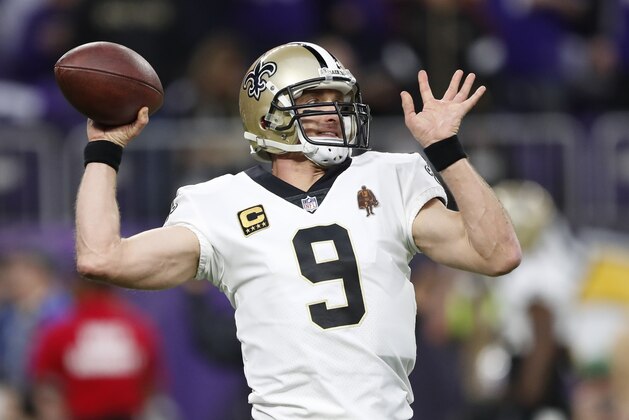 New Orleans Saints quarterback Drew Brees (9) throws before an NFL divisional football playoff game against the Minnesota Vikings in Minneapolis, Sunday, Jan. 14, 2018. (AP Photo/Charlie Neibergall)