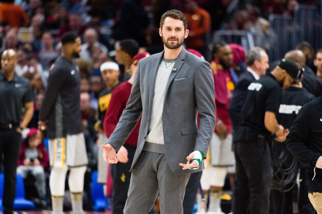 CLEVELAND, OH - FEBRUARY 3: Kevin Love #0 of the Cleveland Cavaliers talks to players on the Houston Rockets bench during a time-out during the second half at Quicken Loans Arena on February 3, 2018 in Cleveland, Ohio. The Rockets defeated the Cavaliers 120-88. NOTE TO USER: User expressly acknowledges and agrees that, by downloading and or using this photograph, User is consenting to the terms and conditions of the Getty Images License Agreement. (Photo by Jason Miller/Getty Images)
