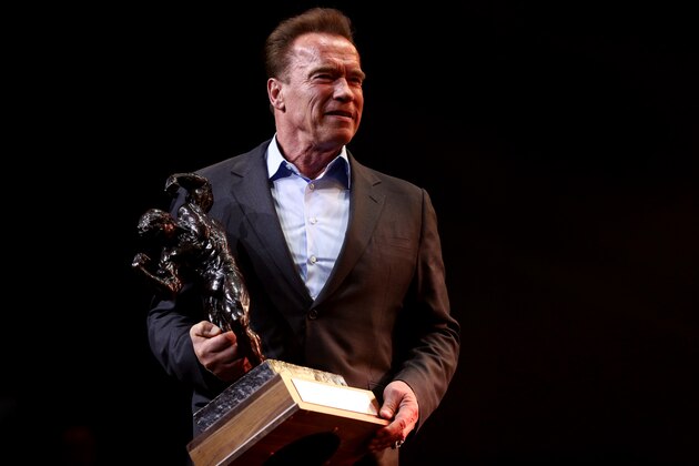 COLUMBUS, OH - MARCH 4: Arnold Schwarzenegger holds the Arnold Classic trophy onstage at the Greater Columbus Convention Center during the Arnold Sports Festival 2017 on March 4, 2017 in Columbus, Ohio. (Photo by Maddie Meyer/Getty Images)