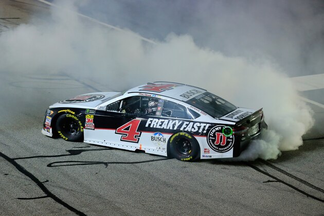 HAMPTON, GA - FEBRUARY 25:  Kevin Harvick, driver of the #4 Jimmy John's Ford, celebrates with a burnout after winning the Monster Energy NASCAR Cup Series Folds of Honor QuikTrip 500 at Atlanta Motor Speedway on February 25, 2018 in Hampton, Georgia.  (Photo by Daniel Shirey/Getty Images)