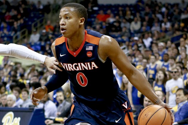 Virginia's Devon Hall (0) plays against Pittsburgh during an NCAA college basketball game, Saturday, Feb. 24, 2018, in Pittsburgh. (AP Photo/Keith Srakocic)
