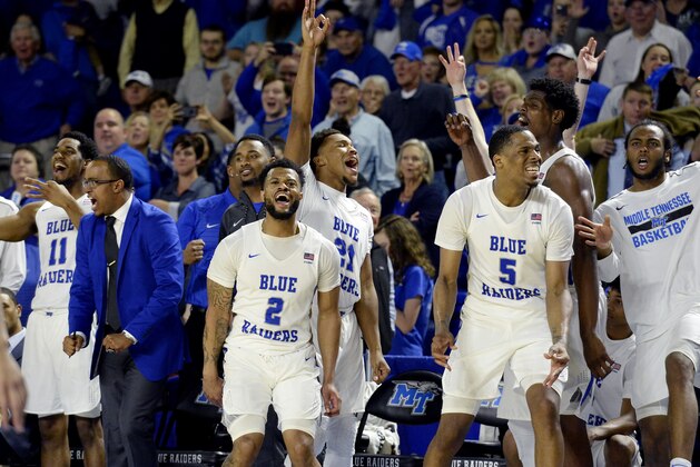 Middle Tennessee players react from the bench after a teammate scored against Western Kentucky during the second half of an NCAA college basketball game Thursday, March 1, 2018, in Murfreesboro, Tenn. Middle Tennessee won 82-64. (AP Photo/Mark Zaleski)