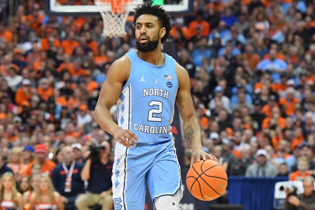 SYRACUSE, NY - FEBRUARY 21:  Joel Berry II #2 of the North Carolina Tar Heels controls the ball against the Syracuse Orange during the first half at the Carrier Dome on February 21, 2018 in Syracuse, New York. North Carolina defeated Syracuse 78-74. (Photo by Rich Barnes/Getty Images)