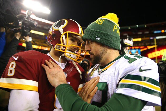 LANDOVER, MD - JANUARY 10: Quarterback Kirk Cousins #8 of the Washington Redskins greets quarterback Aaron Rodgers #12 of the Green Bay Packers after the Green Bay Packers defeated the Washington Redskins 35-18 during the NFC Wild Card Playoff game at FedExField on January 10, 2016 in Landover, Maryland. (Photo by Elsa/Getty Images)