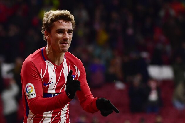 Atletico Madrid's French forward Antoine Griezmann celebrates his third goal during the Spanish league football match Club Atletico de Madrid against Club Deportivo Leganes SAD at the Wanda Metropolitano stadium in Madrid on February 28, 2018. / AFP PHOTO / PIERRE-PHILIPPE MARCOU        (Photo credit should read PIERRE-PHILIPPE MARCOU/AFP/Getty Images)