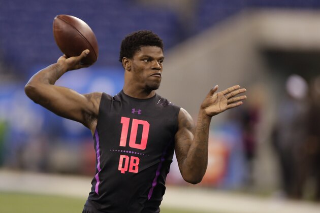 Louisville quarterback Lamar Jackson runs a drill at the NFL football scouting combine in Indianapolis, Saturday, March 3, 2018. (AP Photo/Michael Conroy)