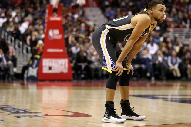 WASHINGTON, DC - FEBRUARY 28: Stephen Curry #30 of the Golden State Warriors looks on against the Washington Wizards at Capital One Arena on February 28, 2018 in Washington, DC. NOTE TO USER: User expressly acknowledges and agrees that, by downloading and or using this photograph, User is consenting to the terms and conditions of the Getty Images License Agreement. (Photo by Patrick Smith/Getty Images)