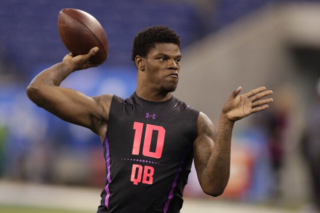 Louisville quarterback Lamar Jackson runs a drill at the NFL football scouting combine in Indianapolis, Saturday, March 3, 2018. (AP Photo/Michael Conroy)