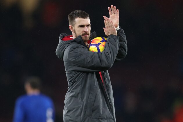 LONDON, ENGLAND - FEBRUARY 03: Scorer of a hat-trick Aaron Ramsey of Arsenal holds the match ball at  the end of the Premier League match between Arsenal and Everton at Emirates Stadium on February 3, 2018 in London, England. (Photo by Catherine Ivill/Getty Images)