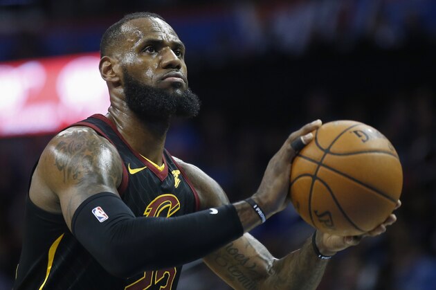 Cleveland Cavaliers forward LeBron James shoots a foul shot during an NBA basketball game against the Oklahoma City Thunder in Oklahoma City, Tuesday, Feb. 13, 2018. (AP Photo/Sue Ogrocki)