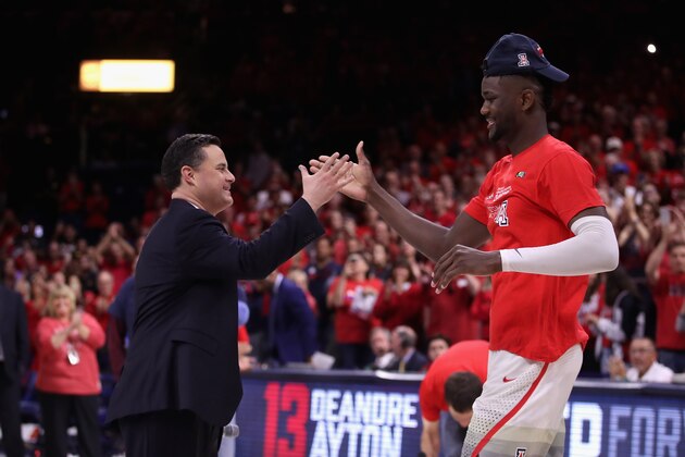 TUCSON, AZ - MARCH 03:  Head coach Sean Miller of the Arizona Wildcats greets Deandre Ayton #13 after defeating the California Golden Bears 66-54 to win the PAC-12 Championship at McKale Center on March 3, 2018 in Tucson, Arizona.  (Photo by Christian Petersen/Getty Images)