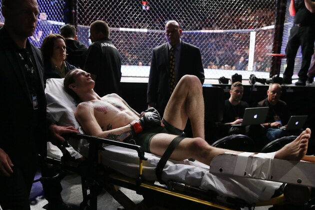 LAS VEGAS, NV - MARCH 03:  Sean O'Malley leaves the arena on a stretcher after injuring his lower right leg during a bantamweight bout against Andre Soukhamthath during UFC 222 at T-Mobile Arena on March 3, 2018 in Las Vegas, Nevada.  (Photo by Isaac Brekken/Getty Images)