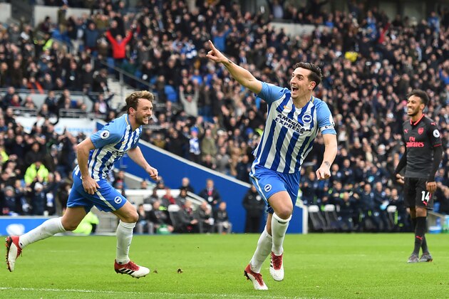 Brighton's English defender Lewis Dunk (C) celebrates after scoring the opening goal of the English Premier League football match between Brighton and Hove Albion and Arsenal at the American Express Community Stadium in Brighton, southern England on March 4, 2018. / AFP PHOTO / Glyn KIRK / RESTRICTED TO EDITORIAL USE. No use with unauthorized audio, video, data, fixture lists, club/league logos or 'live' services. Online in-match use limited to 75 images, no video emulation. No use in betting, games or single club/league/player publications.  /         (Photo credit should read GLYN KIRK/AFP/Getty Images)
