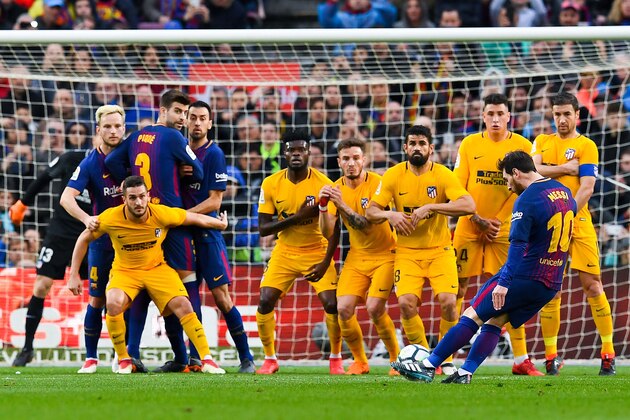 BARCELONA, SPAIN - MARCH 04: Lionel Messi of FC Barcelona scores the opening goal during the La Liga match between Barcelona and Atletico Madrid at Camp Nou on March 4, 2018 in Barcelona, Spain. (Photo by David Ramos/Getty Images) BARCELONA, SPAIN - MARCH 04: Lionel Messi of FC Barcelona scores the opening goal during the La Liga match between Barcelona and Atletico Madrid at Camp Nou on March 4, 2018 in Barcelona, Spain. (Photo by David Ramos/Getty Images)