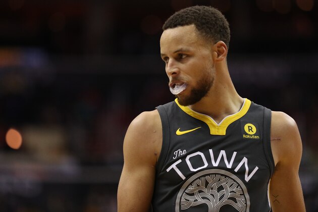 WASHINGTON, DC - FEBRUARY 28: Stephen Curry #30 of the Golden State Warriors looks on against the Washington Wizards at Capital One Arena on February 28, 2018 in Washington, DC. NOTE TO USER: User expressly acknowledges and agrees that, by downloading and or using this photograph, User is consenting to the terms and conditions of the Getty Images License Agreement. (Photo by Patrick Smith/Getty Images)
