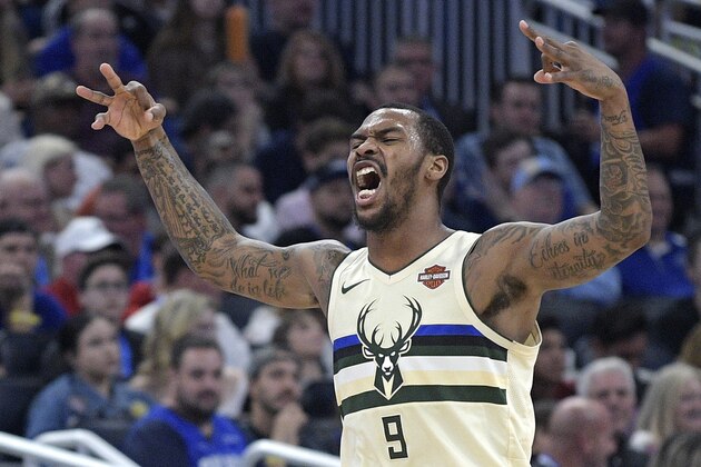 Milwaukee Bucks guard Sean Kilpatrick (9) celebrates after scoring a 3-pointer during the second half of an NBA basketball game against the Orlando Magic Saturday, Feb. 10, 2018, in Orlando, Fla. The Bucks won 111-104. (AP Photo/Phelan M. Ebenhack)