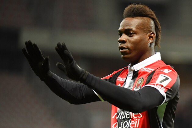 Nice's Italian forward Mario Balotelli celebrates after scoring a goal during the French L1 football match Nice (OGCN) vs Lille (LOSC) on March 2, 2018 at Allianz Riviera Stadium in Nice.  / AFP PHOTO / YANN COATSALIOU        (Photo credit should read YANN COATSALIOU/AFP/Getty Images)