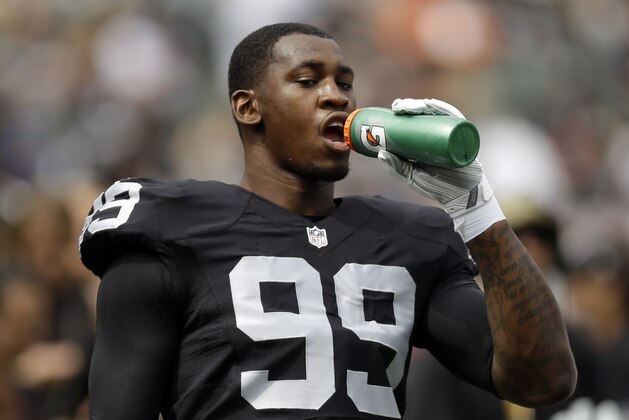 Oakland Raiders defensive end Aldon Smith during an NFL football game against the Cincinnati Bengals in Oakland, Calif., Sunday, Sept. 13, 2015. (AP Photo/Ben Margot)