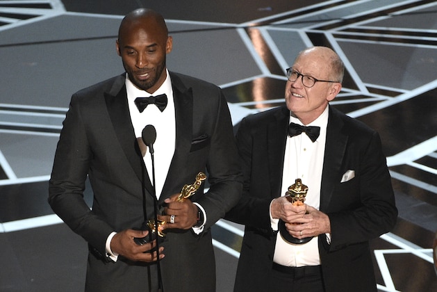 Kobe Bryant, left, and Glen Keane accept the award for best animated short for
