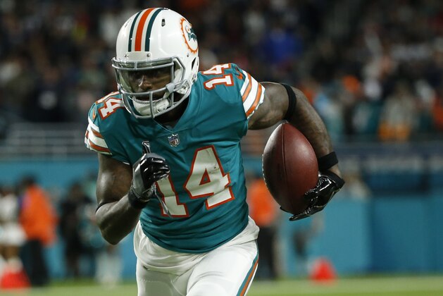 Miami Dolphins wide receiver Jarvis Landry (14) runs the ball, during the first half of an NFL football game against the New England Patriots, Monday, Dec. 11, 2017, in Miami Gardens, Fla. (AP Photo/Wilfredo Lee) Miami Dolphins wide receiver Jarvis Landry (14) runs the ball, during the first half of an NFL football game against the New England Patriots, Monday, Dec. 11, 2017, in Miami Gardens, Fla. (AP Photo/Wilfredo Lee)