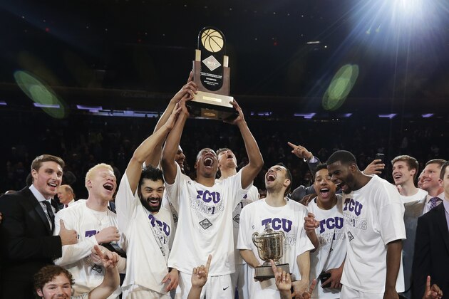 TCU celebrates after beating Georgia Tech in the NCAA college basketball game in the final of the NIT Thursday, March 30, 2017, in New York. (AP Photo/Frank Franklin II)