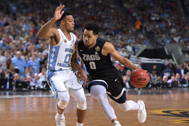 GLENDALE, AZ - APRIL 03: Silas Melson #0 of the Gonzaga Bulldogs drives against Nate Britt #0 of the North Carolina Tar Heels during the 2017 NCAA Men's Final Four Championship at University of Phoenix Stadium on April 3, 2017 in Glendale, Arizona. North Carolina defeated Gonzaga 71-65. (Photo by Lance King/Getty Images)